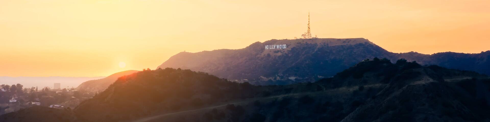Sunset over Hollywood Hills showcasing the iconic Hollywood sign in Los Angeles skyline