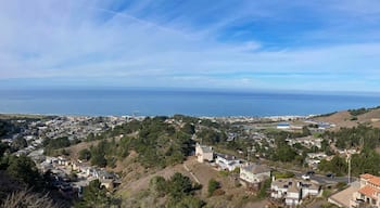 Scenic aerial panoramic view of Sharp Park residential neighborhood and Milagra Ridge in Pacifica, California from Pacifica Vista Point at Sharp Park Road.