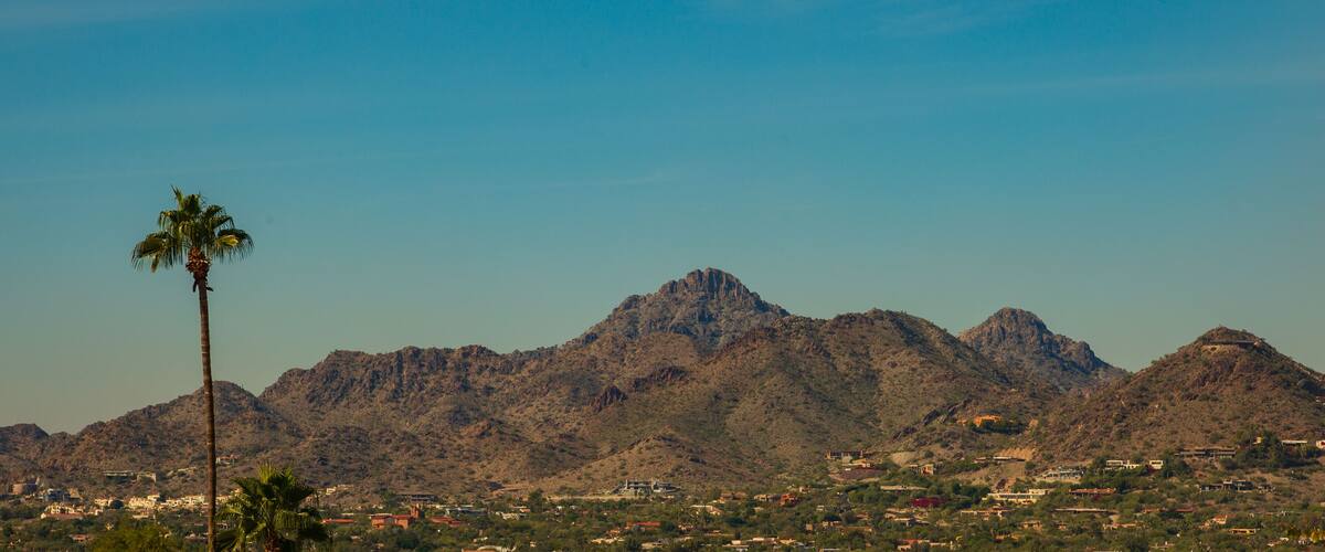 Neighborhoods at the base of tall mountains are rapidly growing in the Phoenix, Arizona area where population is steadily growing. Housing in these mountain base developments are usually more expensiv