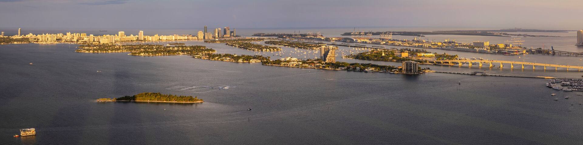 Aerial view of serene Miami skyline at sunset over Biscayne Bay, Edgewater, Florida, United States.