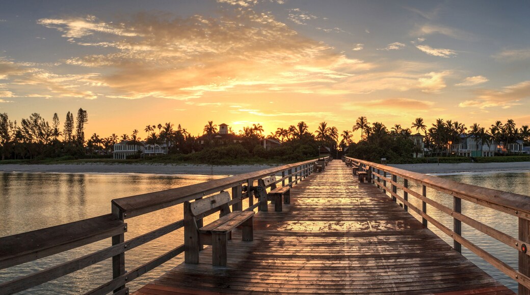 Early sunrise over the Naples Pier on the Gulf Coast of Naples, Florida