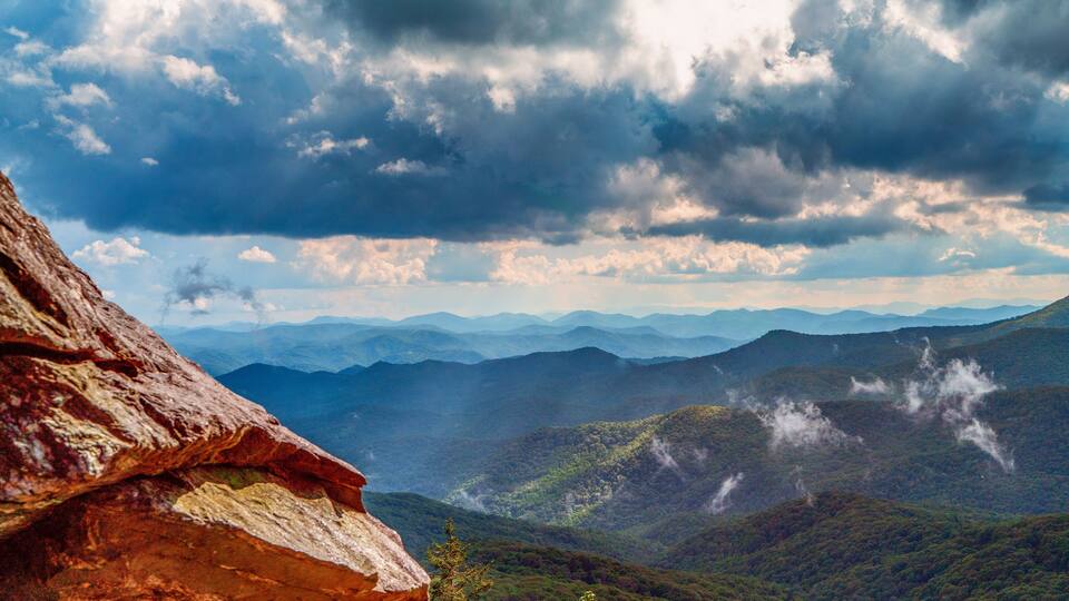 The Appalachian mountains on the North Carolina and Tennessee border shows the smokiness that gives them the name Smoky.