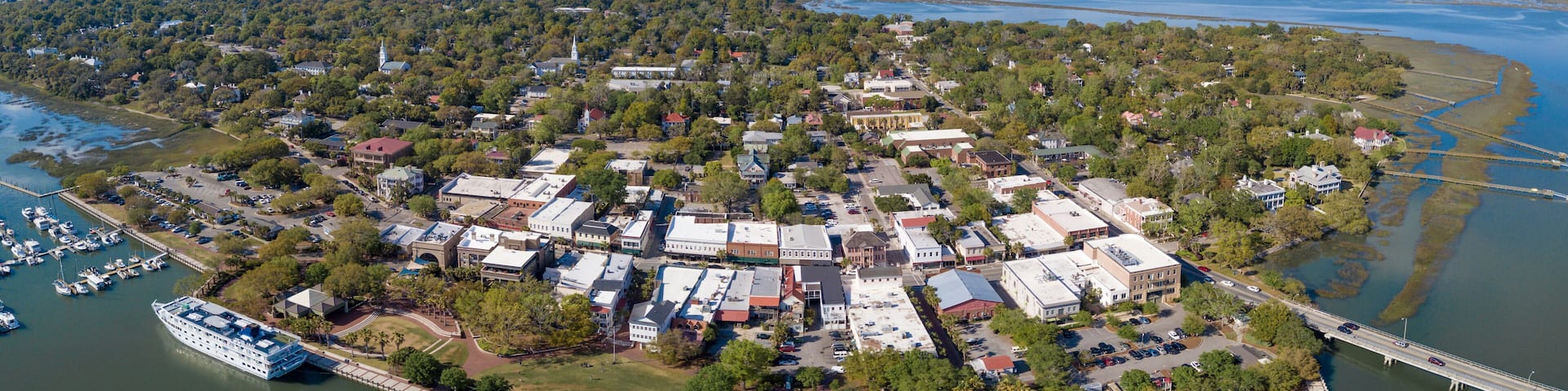 Aerial panorama of Beaufort, South Carolina with cruise ship in port.