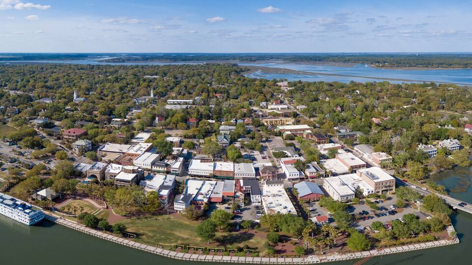 Aerial panorama of Beaufort, South Carolina with cruise ship in port.