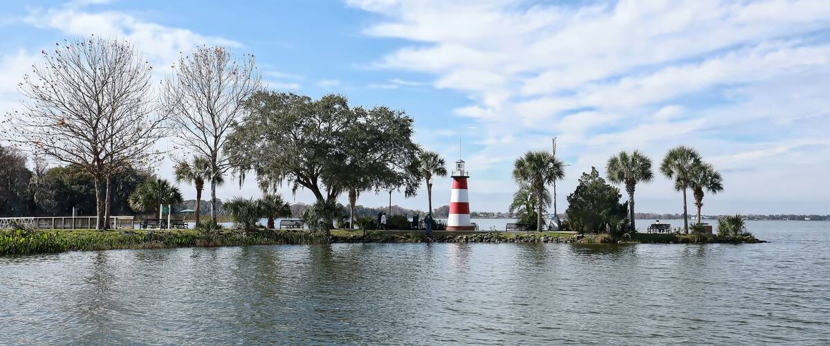 Dramatic skies over Mount Dora's Lighthouse, located at the Port of Mount Dora in Grantham Point Park, Florida, USA.