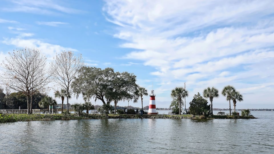Dramatic skies over Mount Dora's Lighthouse, located at the Port of Mount Dora in Grantham Point Park, Florida, USA.