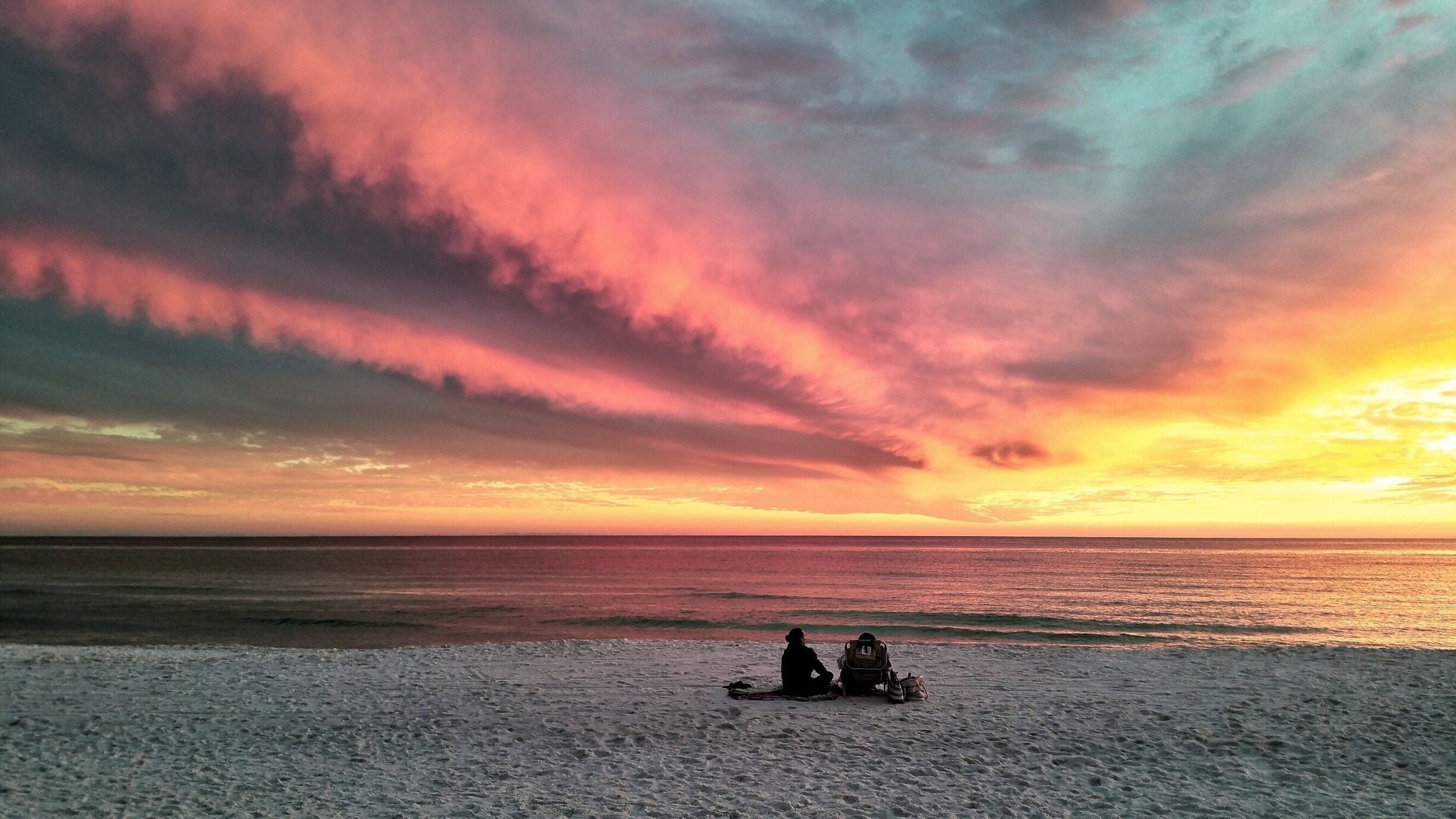 Enjoying the beach as Roll Clouds catch fire from the setting sun

#beach photo contest