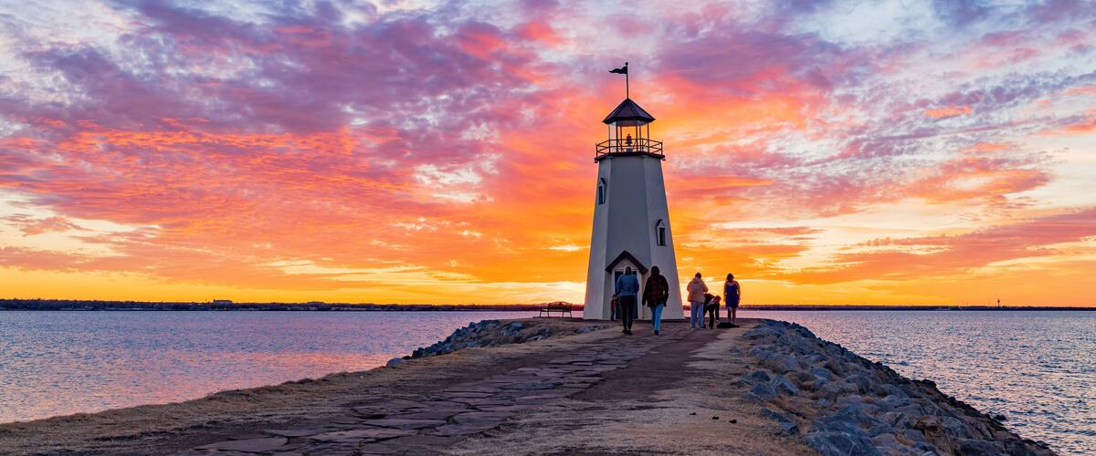 Sunset beautiful afterglow over the lighthouse of Lake Hefner