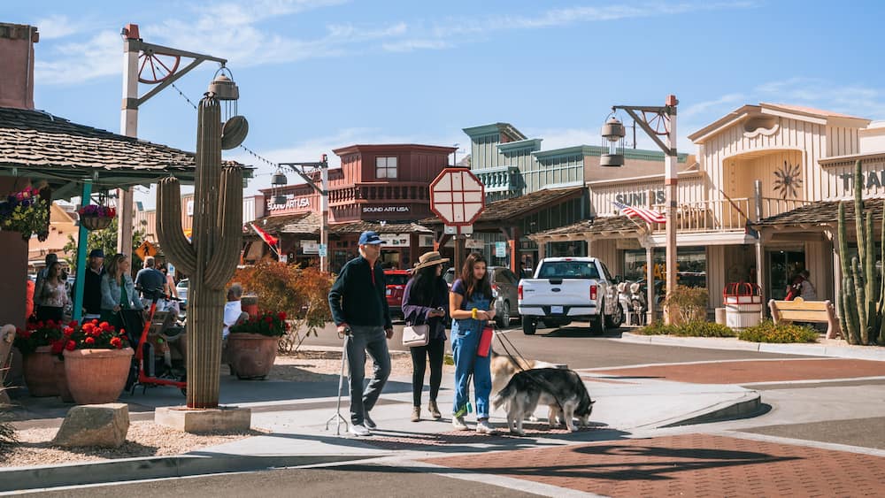 Downtown Scottsdale featuring street scenes, a small town or village and cuddly or friendly animals