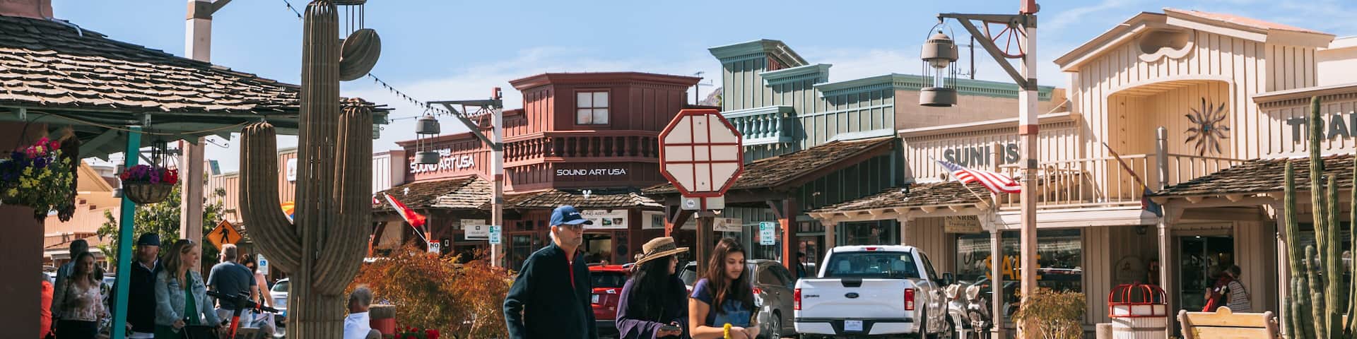 Downtown Scottsdale featuring street scenes, a small town or village and cuddly or friendly animals