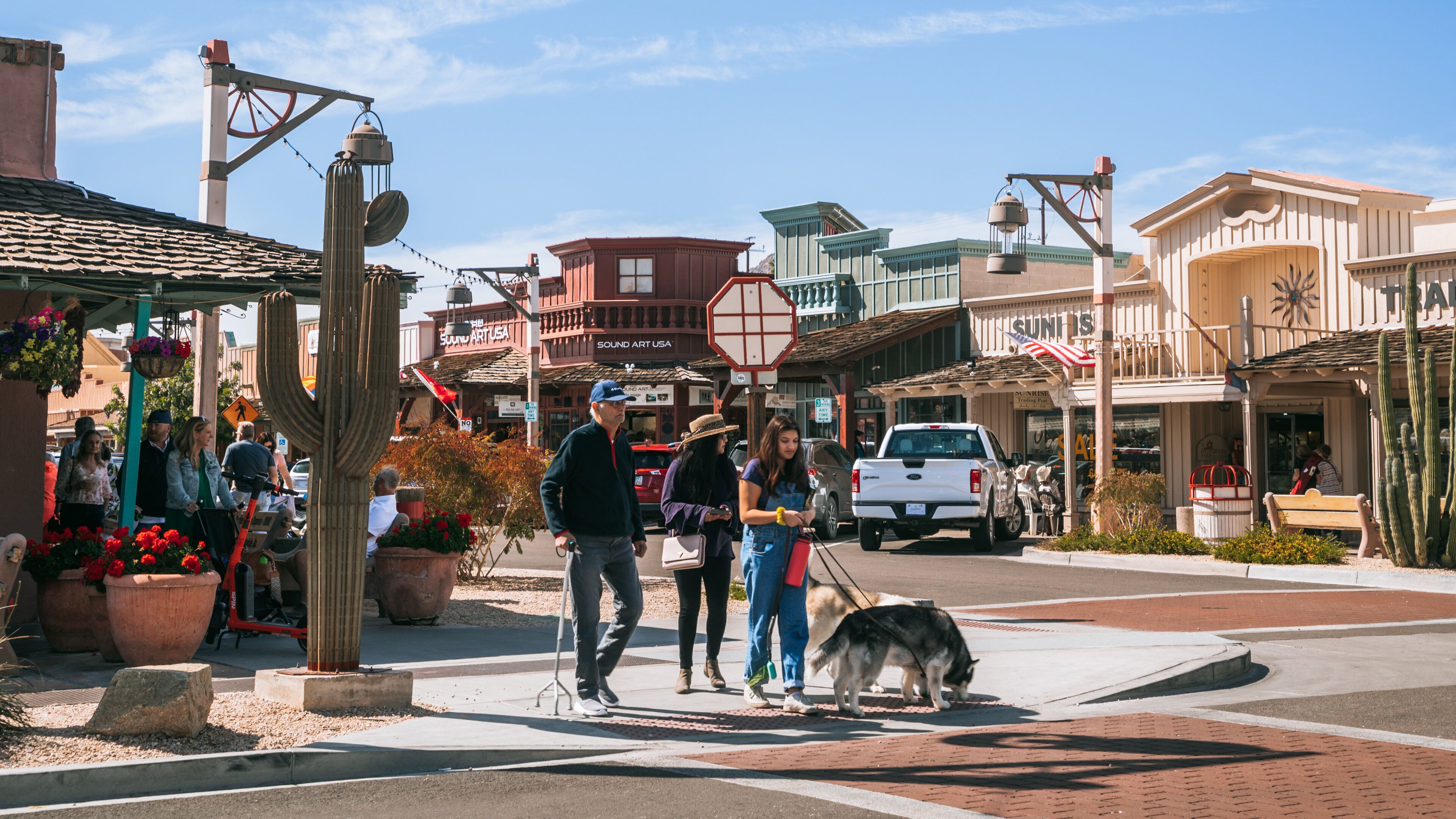 Downtown Scottsdale featuring street scenes, a small town or village and cuddly or friendly animals