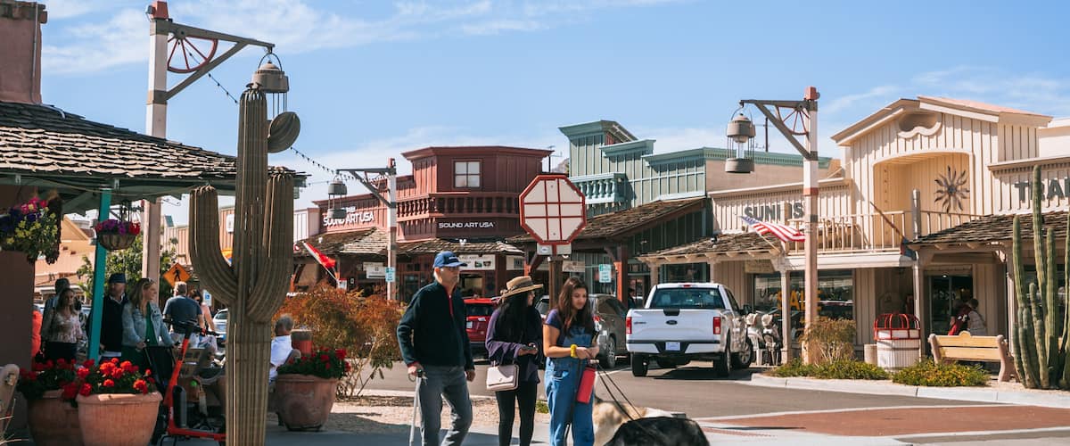 Downtown Scottsdale featuring street scenes, a small town or village and cuddly or friendly animals