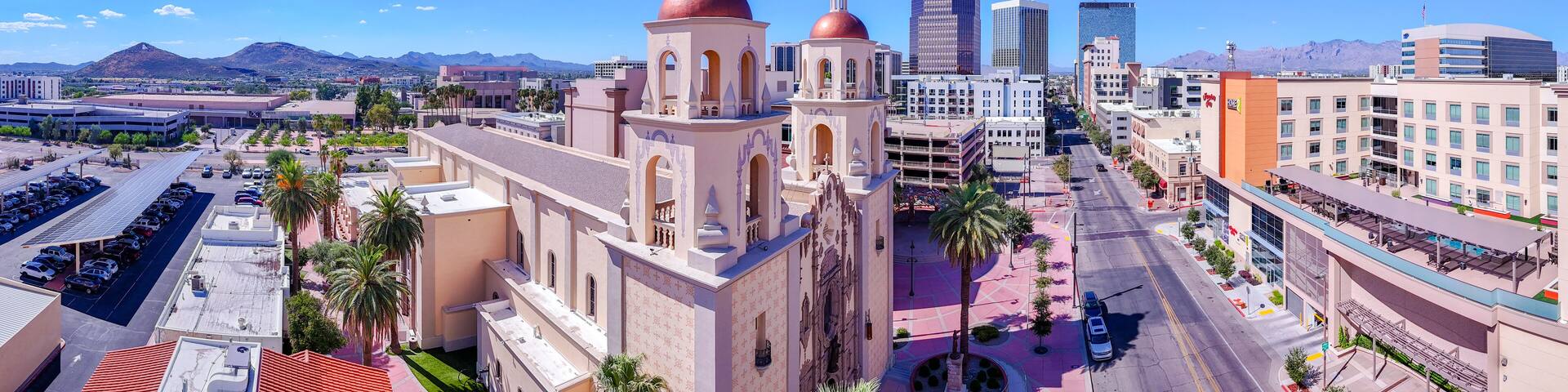 Tucson Arizona, USA: The old St. Augustine Cathedral in visual contrast against the corporate buildings of downtown.