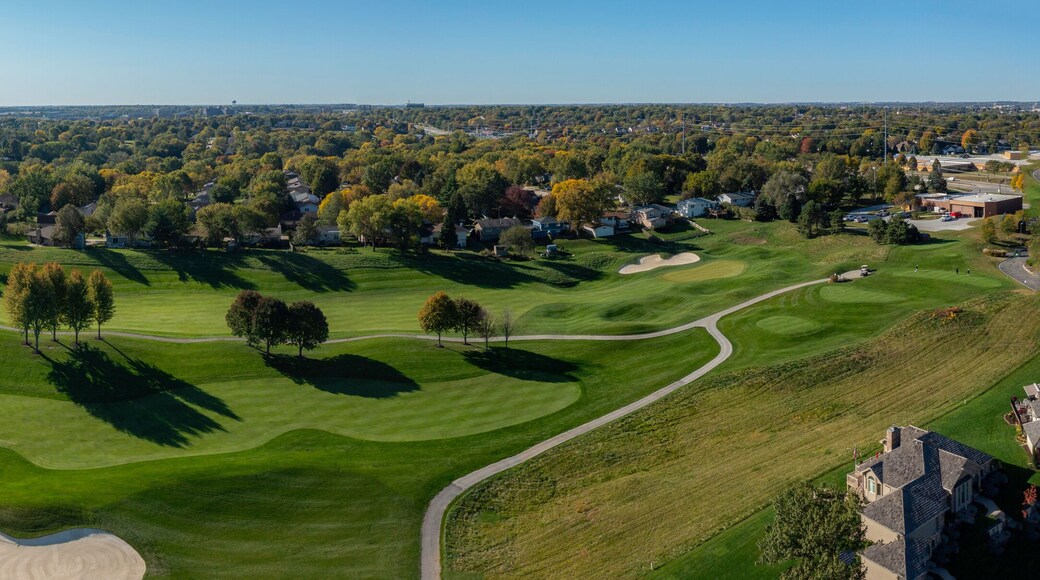 Aerial golf course images of scenic golf holes.