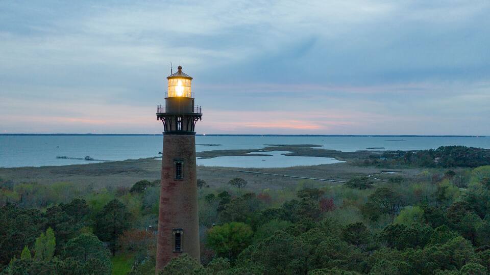 Sun Setting at Currituck Lighthouse Outer Banks North Carolina