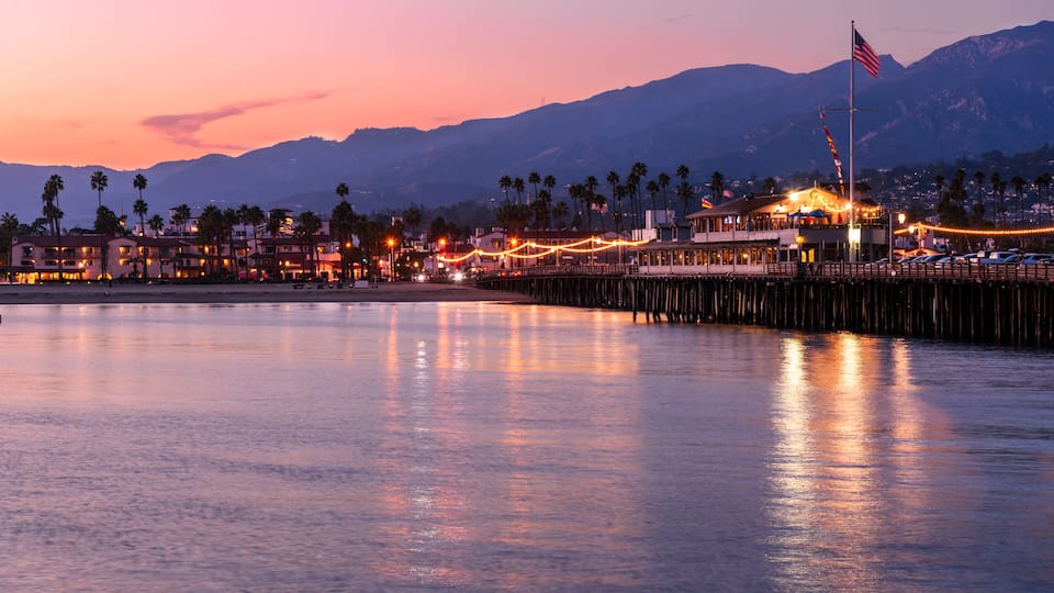 View of Stearns Wharf in Santa Barbara, California, at dusk in autumn