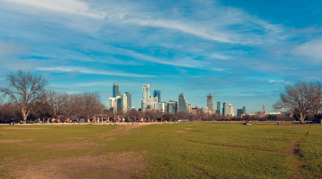 The lawns and open fields of Zilker Park, with the Austin skyline in the background, Texas, USA