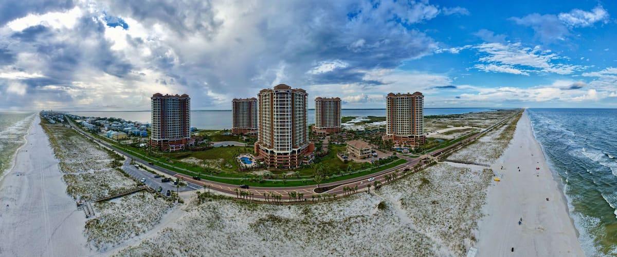 Panoramic aerial view of the beautiful beach and the buildings in Pensacola Beach, Florida, US