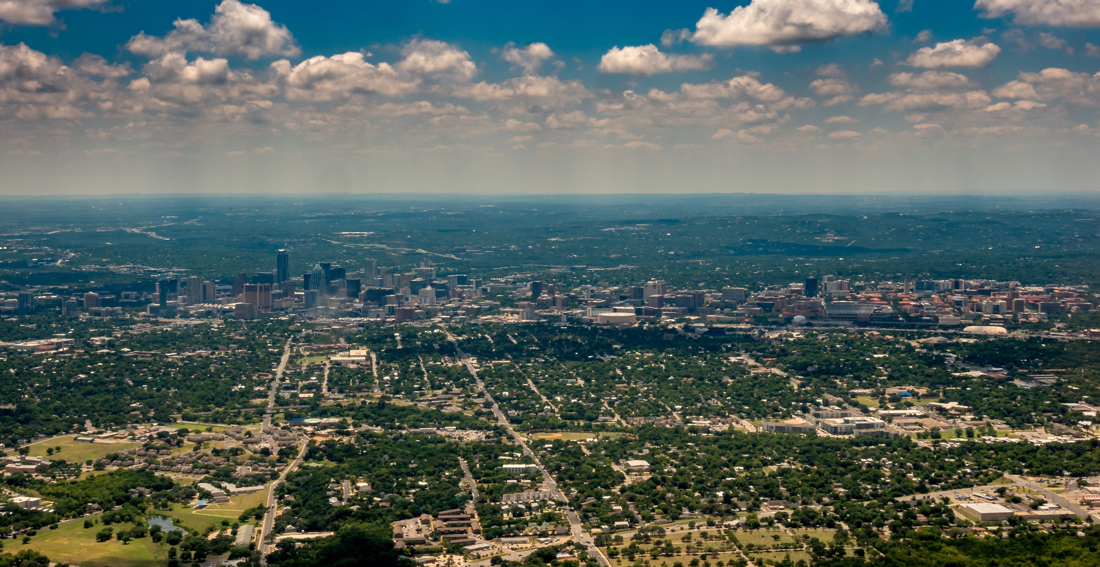 Downtown Austin TX from the air with Cloudy skies