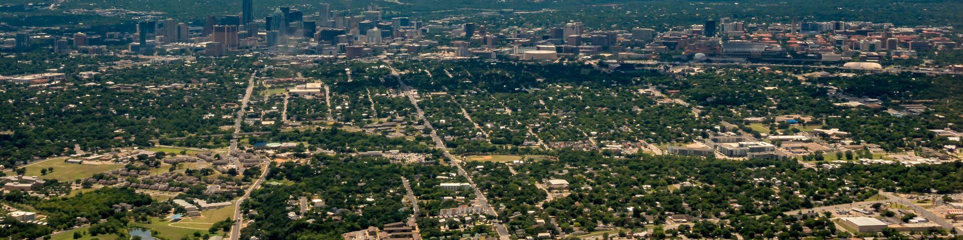 Downtown Austin TX from the air with Cloudy skies