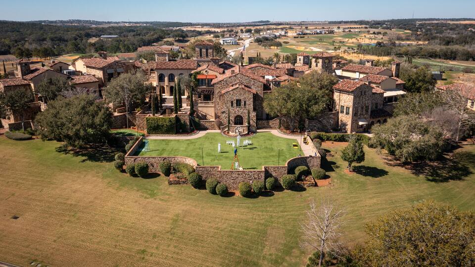 Montverde, FL USA - 2-12-2022: Drone view of the Grand Lawn wedding ceremony area at Bella Collina clubhouse.