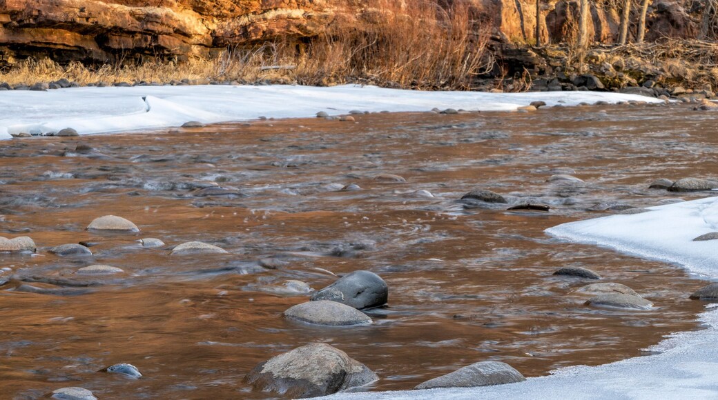 Poudre River and sandstone cliff near Fort Collins, Colorado, in winter scenery