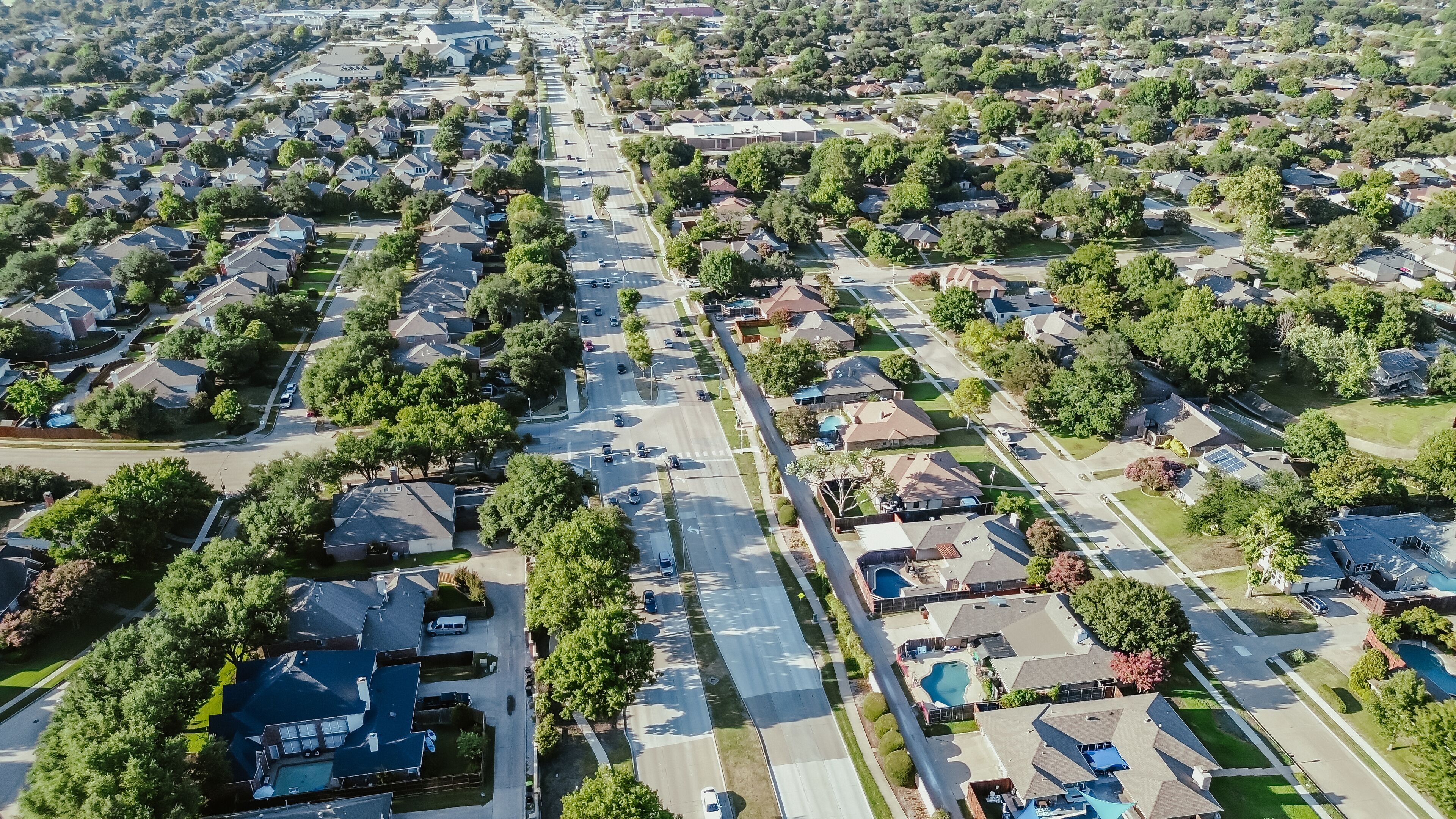 Suburban residential houses along Coit Road West Plano, Texas, single-family homes with swimming pool in River Bend, Wentworth Estates, High Place, Stonewood Glen neighborhood W Parker Rd, aerial