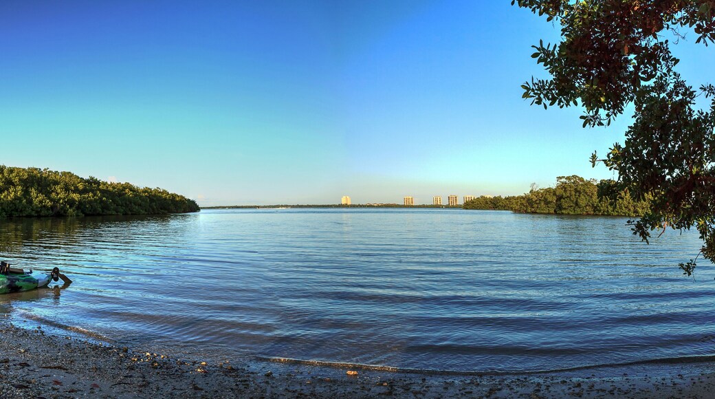 Fishing Kayak ready for launch on the shore of Estero Bay on Big Hickory Island