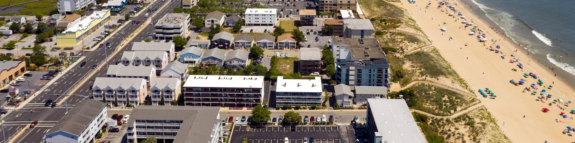 People Flock to the Beach on a 90 plus degree day in Ocean City Maryland