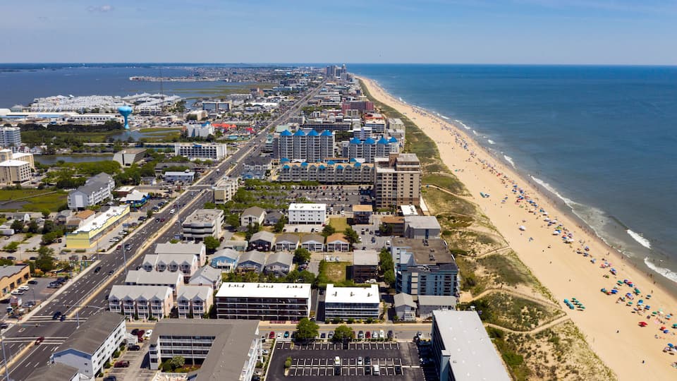 People Flock to the Beach on a 90 plus degree day in Ocean City Maryland