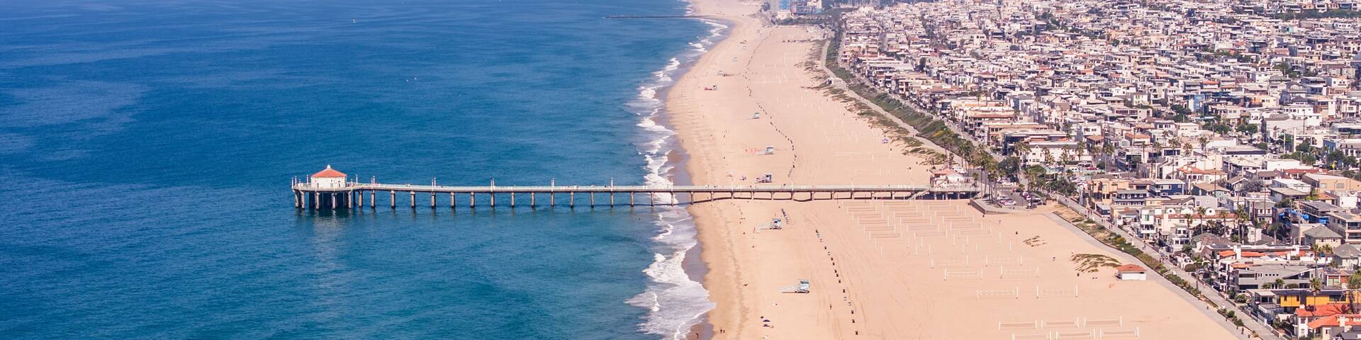 Manhattan Beach, Los Angeles, California, USA - 23-10-1, aerial landscape view along Manhattan Beach with Manhattan Beach Pier which protrudes into the water of Pacific Ocean