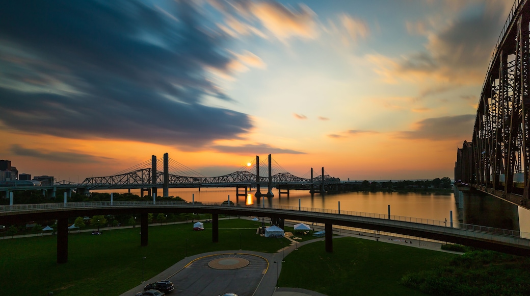 The Abraham Lincoln Bridge crosses the Ohio River that connects Kentucky and Indiana for motor vehicles. Long exposure sky and water movement.