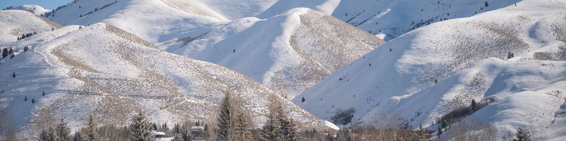 View of the Snowy Sawtooth Mountains on Sunny Day in Ketchum, ID
