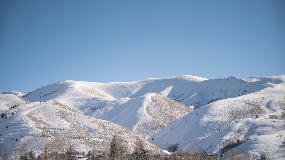 View of the Snowy Sawtooth Mountains on Sunny Day in Ketchum, ID