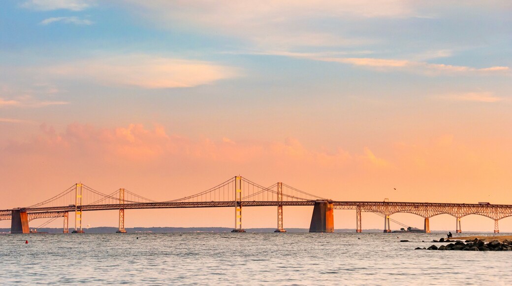 Chesapeake Bay Bridge with blue and orange sunset