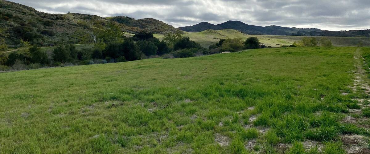 Wide view of Santa Monica Mountains at Rancho Sierra Vista, Satwiwa Native American Indian Natural Area, next to Point Mugu State Park, on overcast day