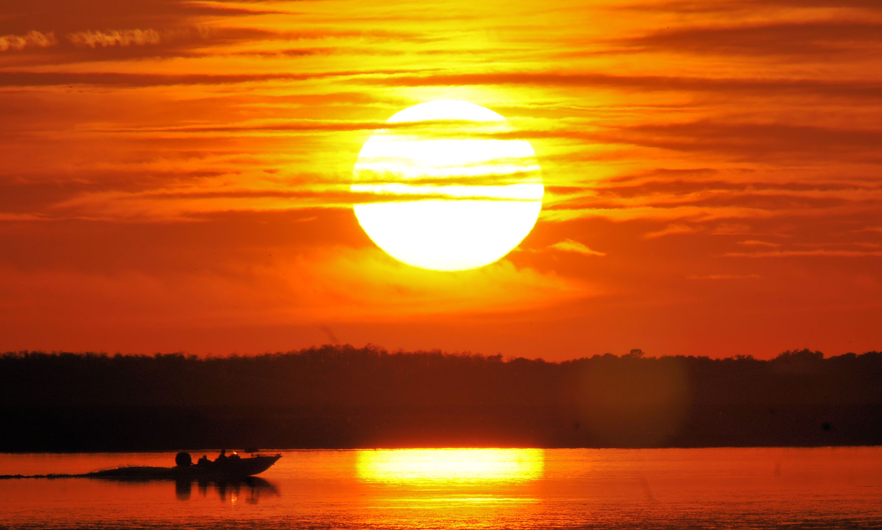 Boat at sunset / Twin Oaks Conservation Area near Kissimmee, Florida.