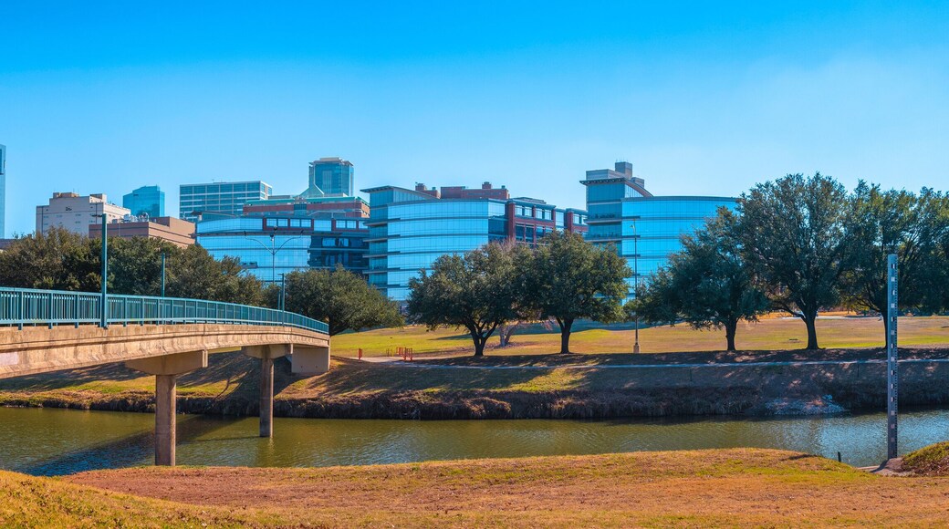 Fort Worth panoramic city skyline and building architecture over Trinity River, cityscape with natural open space and trails