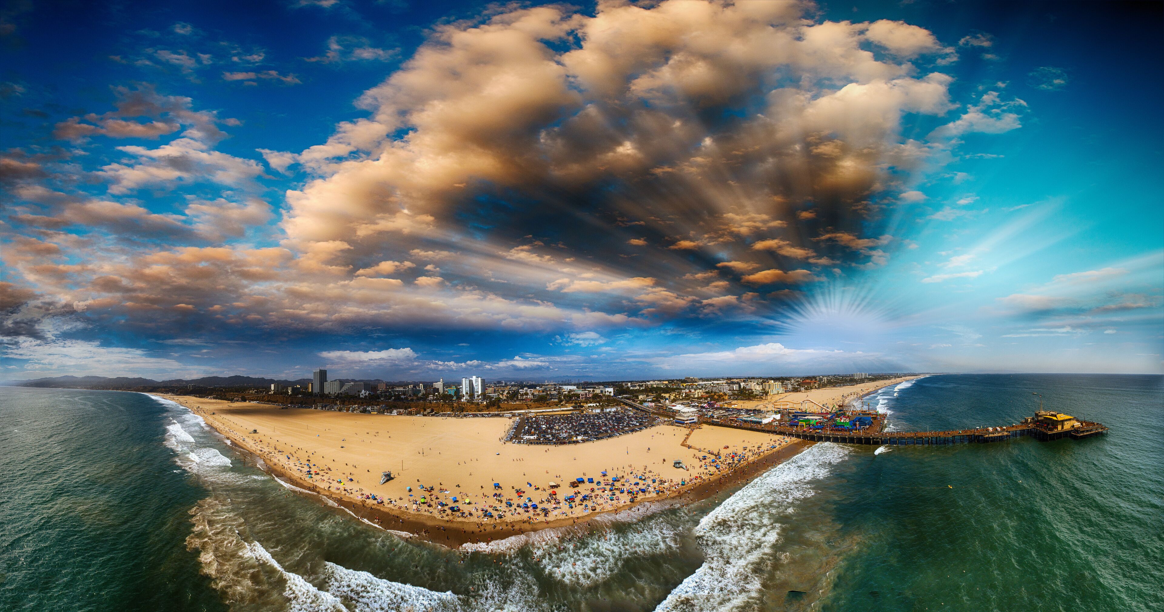 Santa Monica Pier and Beach, CA. Sunset panoramic aerial view