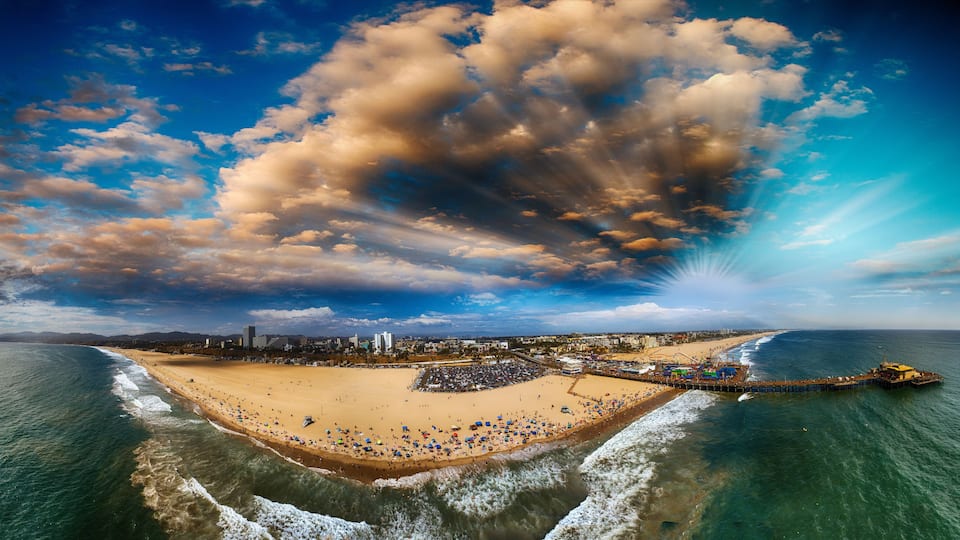 Santa Monica Pier and Beach, CA. Sunset panoramic aerial view