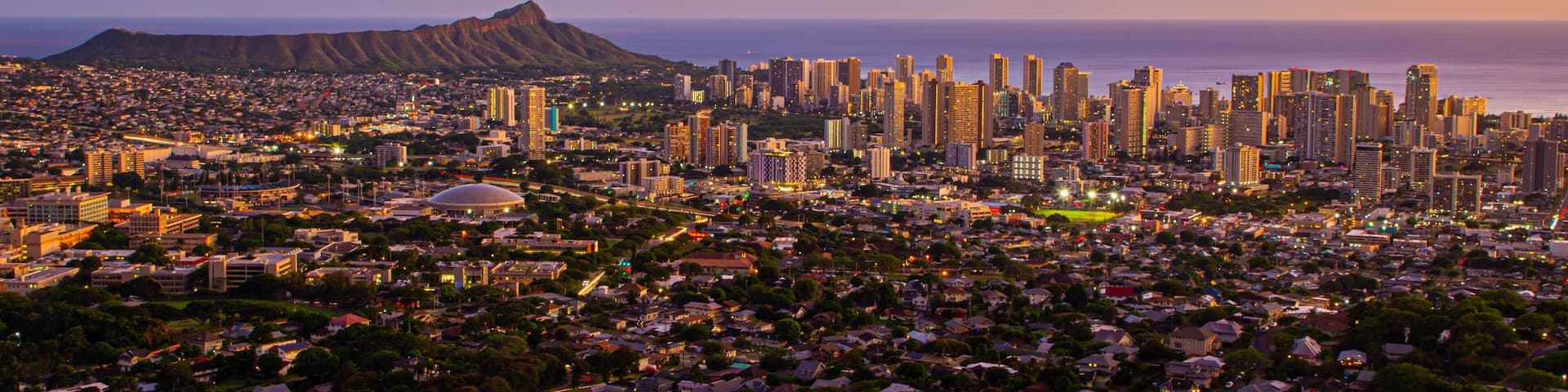 Tantalus showing landscape views, a sunset and a city
