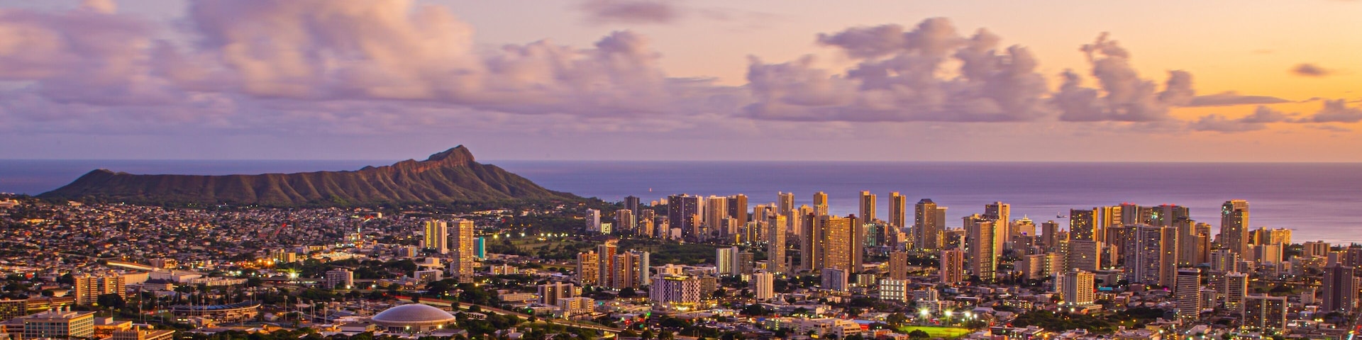 Tantalus showing landscape views, a sunset and a city