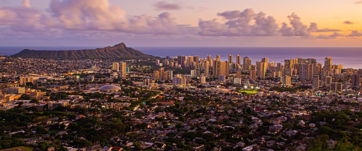 Tantalus showing landscape views, a sunset and a city