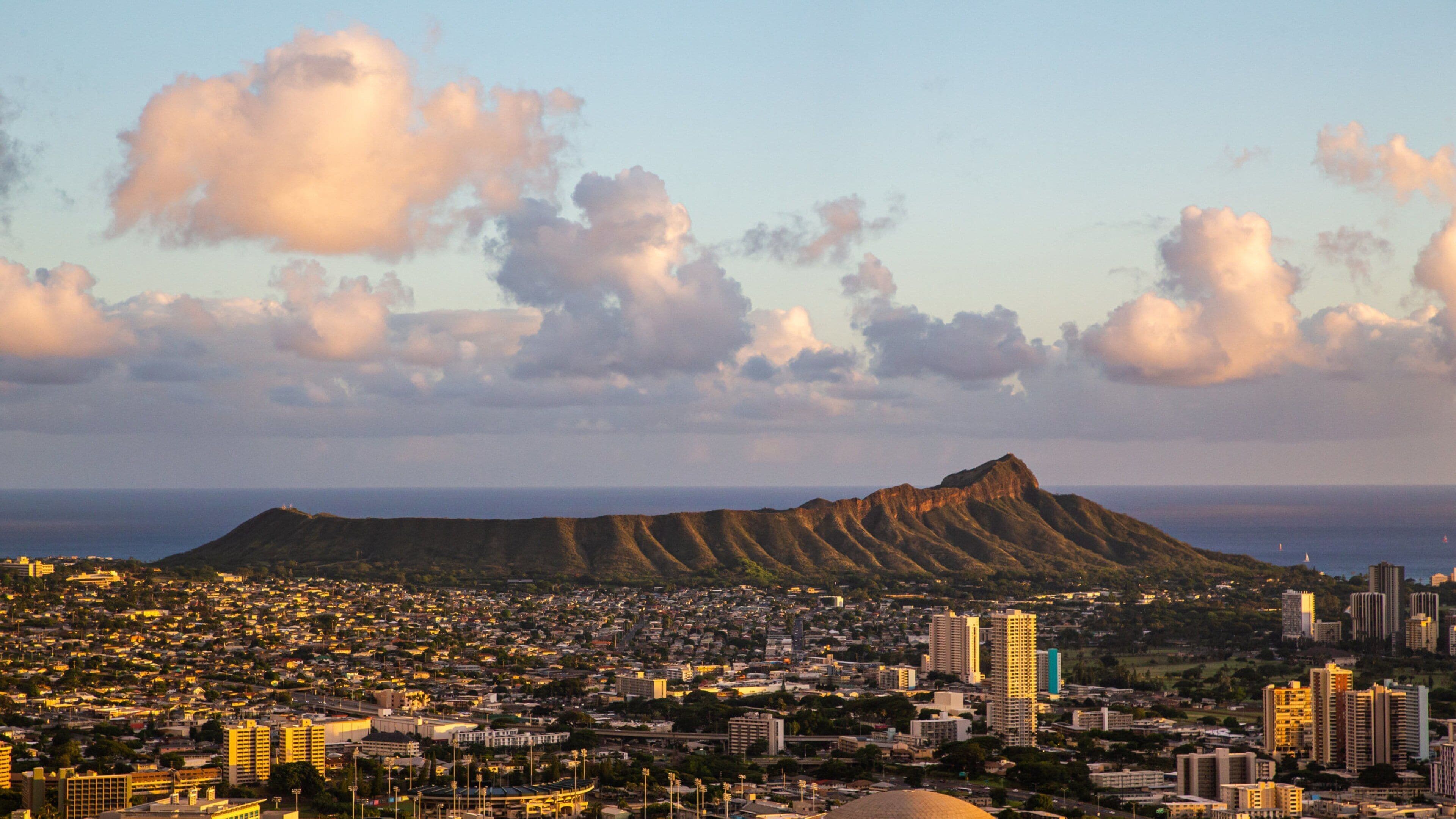 Tantalus which includes a city, landscape views and a sunset