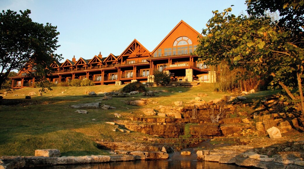 Falls Lodge as the sunsets. One of the 3 buildings with "hotel" accommodations at Big Cedar Lodge in additions to the cabins. Falls Lodge has rooms featuring two double beds and king bed rooms that feature gas fireplaces. The views are of the ground and Table Rock Lake are beautiful and the lobby is a mic enlace to relax with some wine and enjoy one of the two gas fire places.