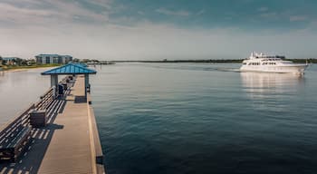 Smyrna Dunes Fishing Pier with Yacht in New Smyrna Beach, Florida