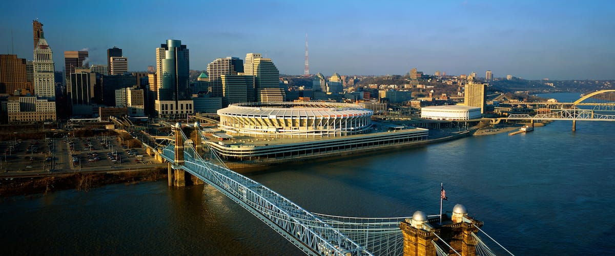 This is the Ohio River with the Roebling Suspension Bridge over it. At the end of the bridge is Three Rivers Stadium and the Cincinnati skyline.