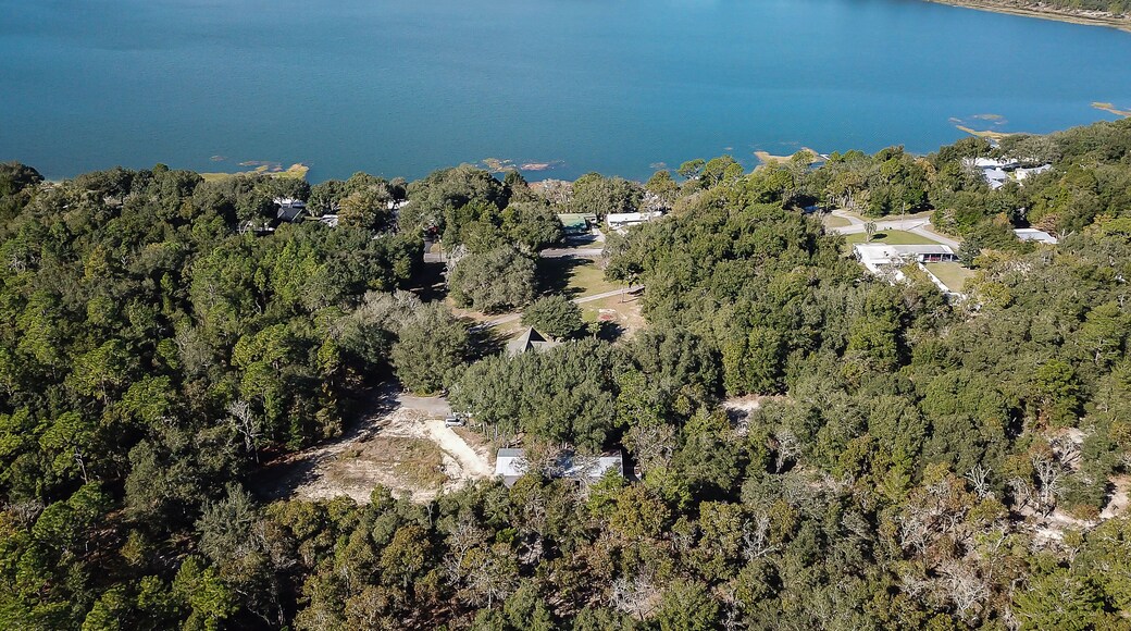 Aerial view of a lake in Keystone Heights Florida. Flying a drone over the lake.