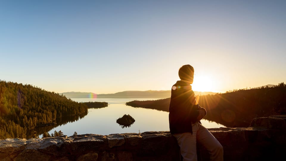 A tourist man bathing sunrise at Emerald Bay, Lake Tahoe, California