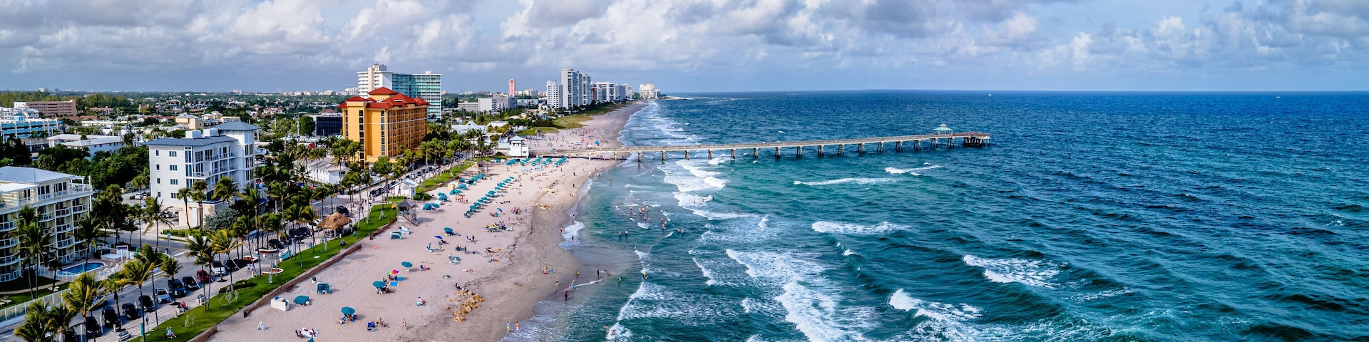 Beach and ocean with city of Deerfield Beach, Florida